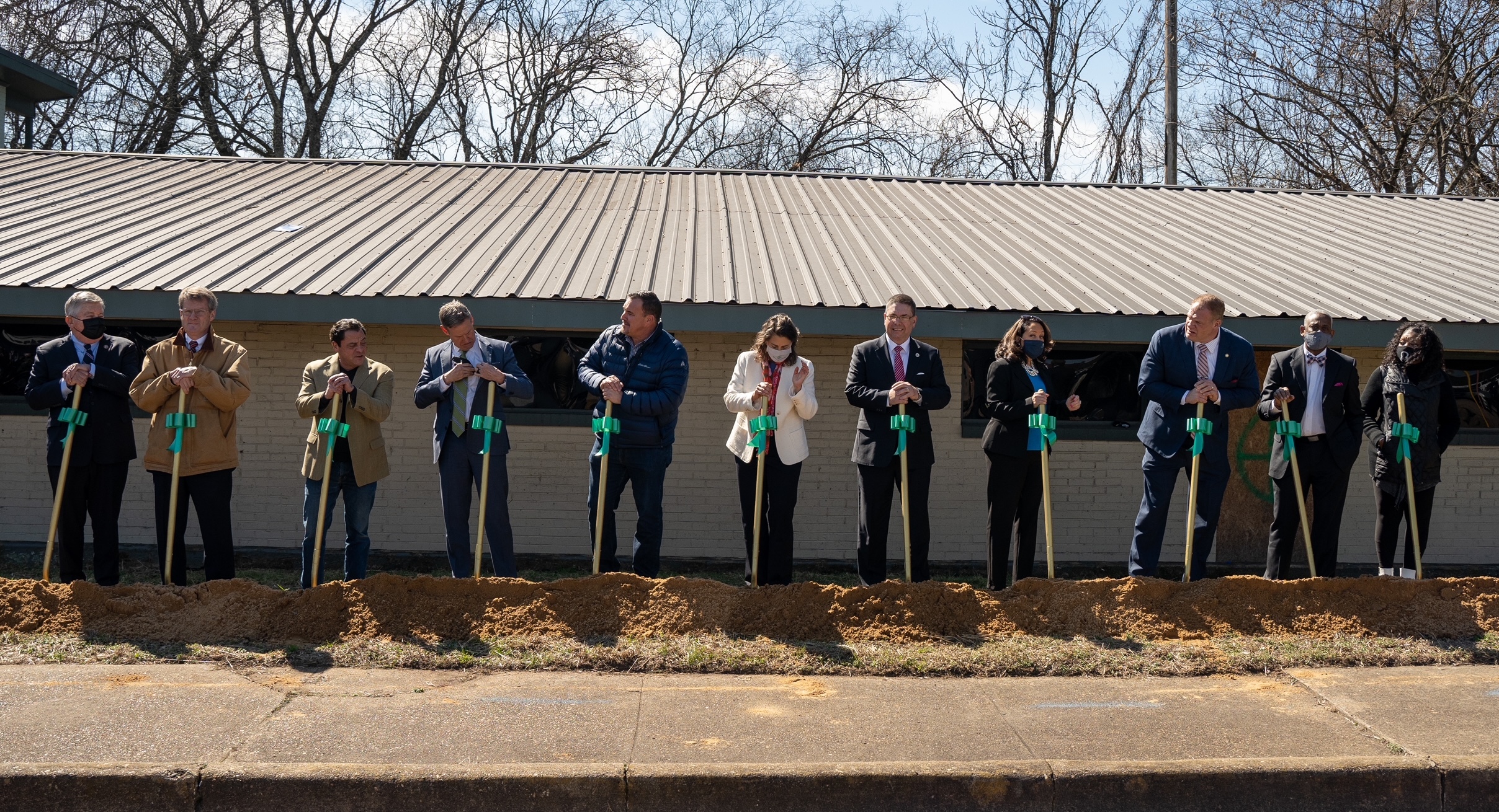 Community leaders in East Knoxville help break ground on Dogan Gaither Flats